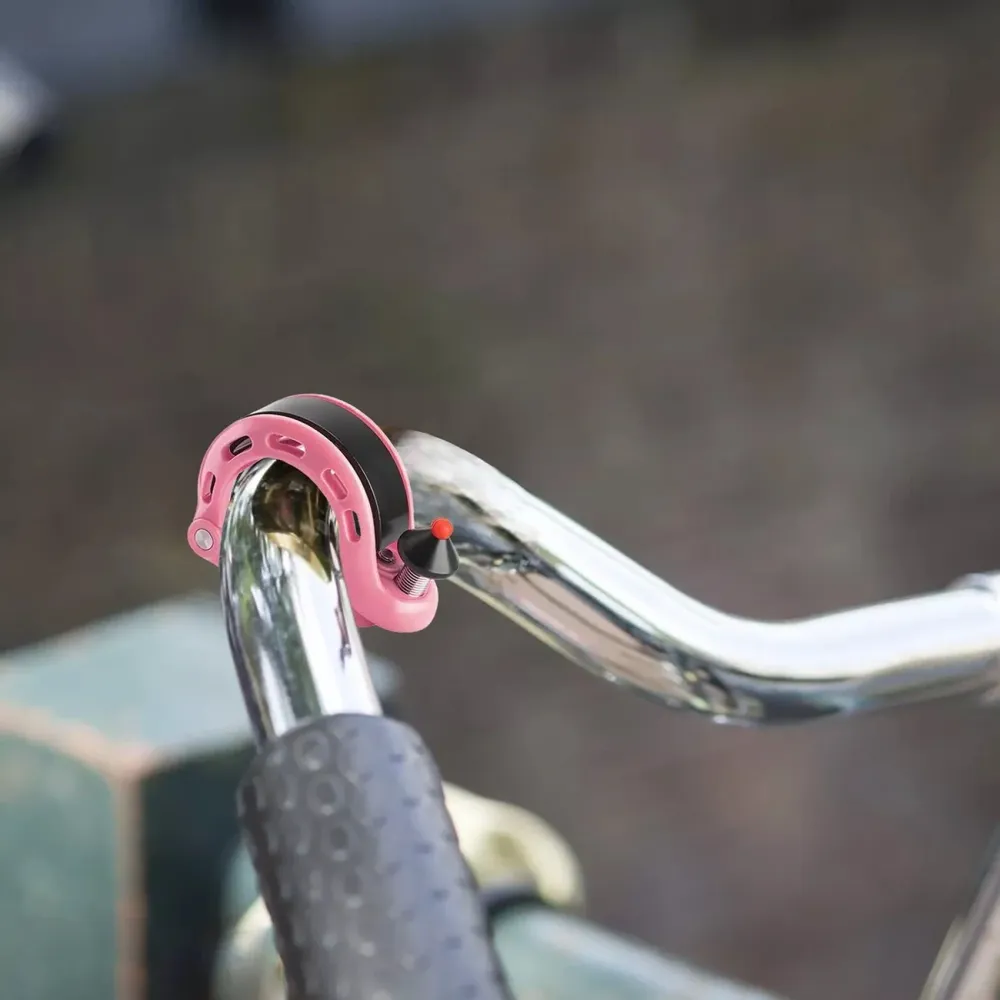 Campainha de bicicleta em forma de Q