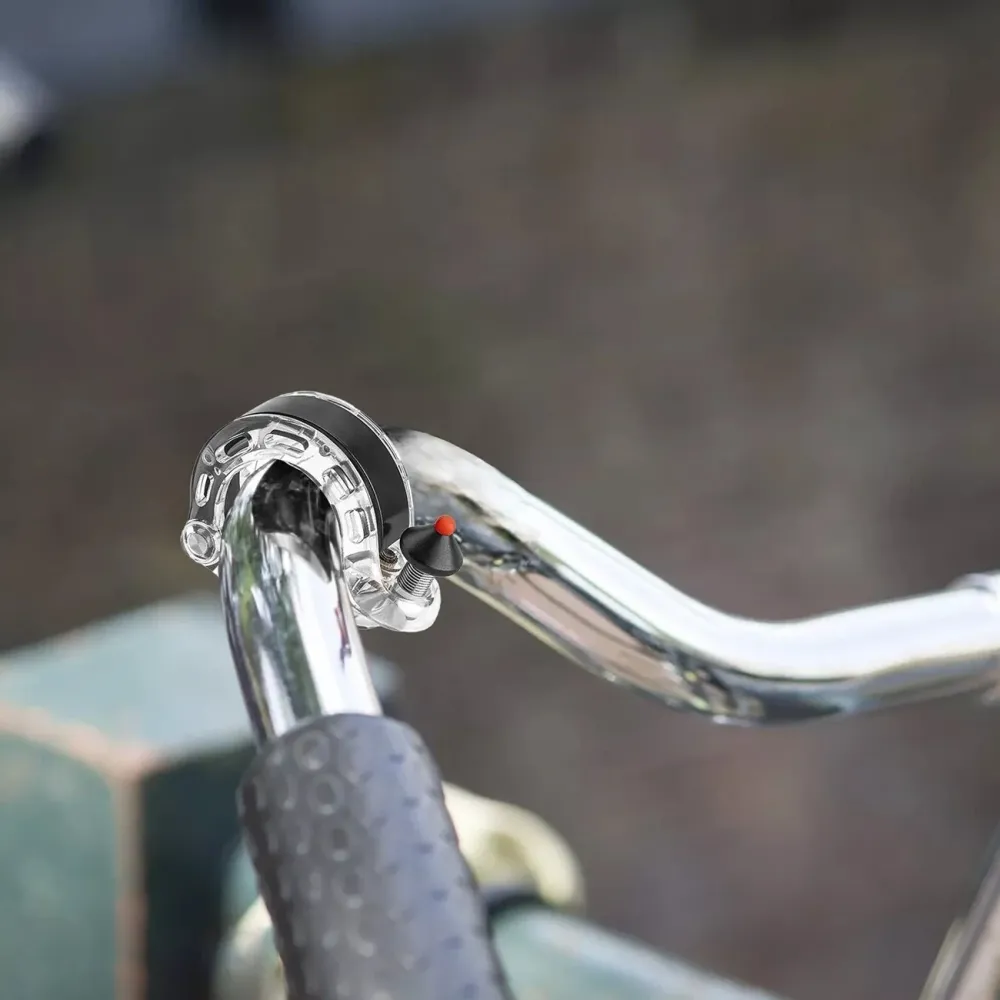 Campainha de bicicleta em forma de Q