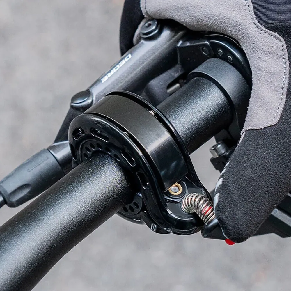 Campainha de bicicleta em forma de Q