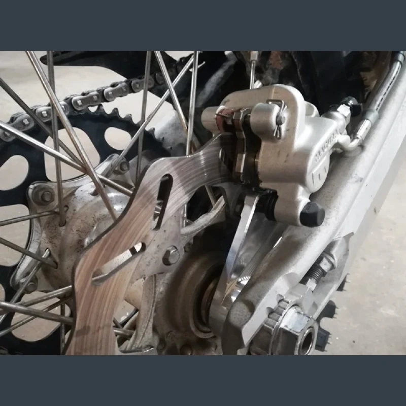 Protecção de Disco Traseiro com Suporte de Pinç P-TECH para HUSQVARNA TE 150/250/300 20-23